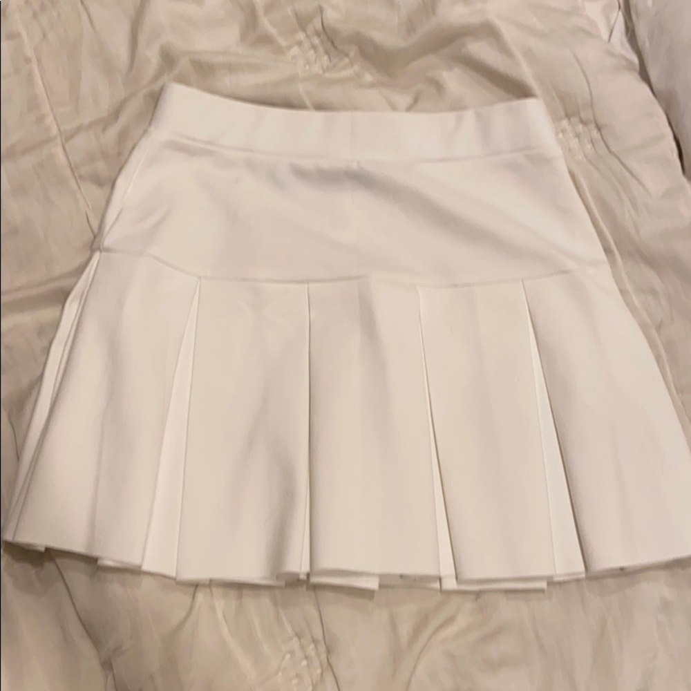White pleated skirt